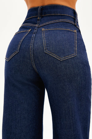 Calça Jeans de Rica Estilo Alfaiataria Tecnológica Wide Leg Cós Super Alto Jeans Escuro