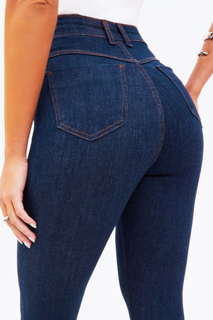 Calça Jeans Flare Modeladora Revolucionária Cós Super Alto Barra Corte a Laser Escura