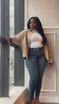 Stories de Calça Jeans Modeladora Essencial Skinny Cós Super Alto Barra Corte a Laser