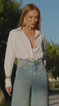 Stories de Camisa Impermeável Manga Longa Branca