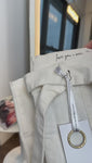 Stories de Calça Jeans de Rica Tecnológica Wide Leg Off White Cós Super Alto