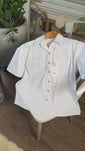 Stories de Camisa Impermeável Manga Curta Branca